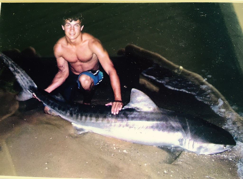 Jake at 16 with a tiger shark.